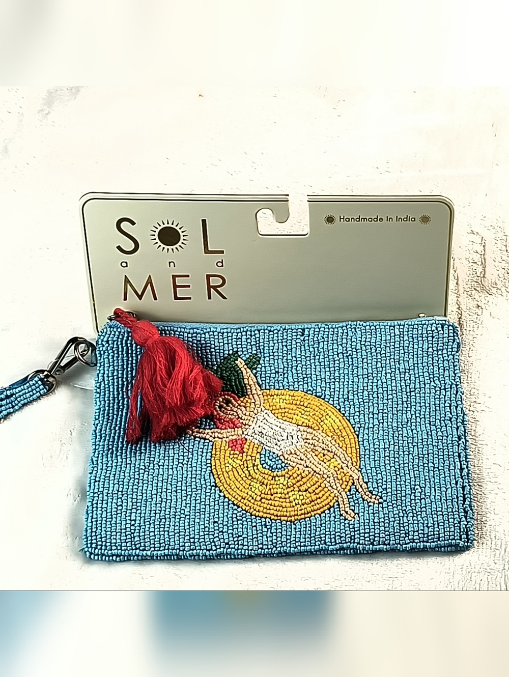 Sol and Mer Blue Beaded Wristlet Clutch with Red Tassel